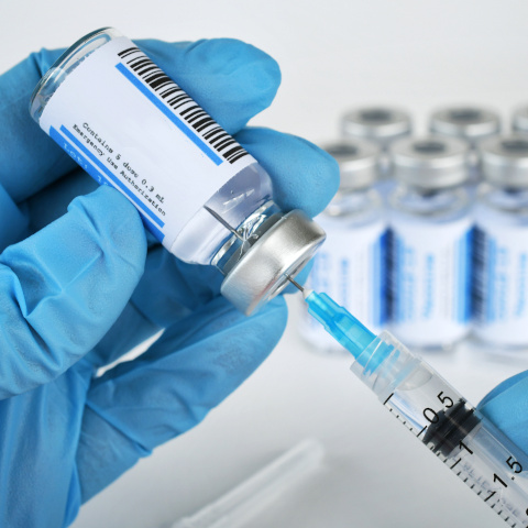 Intro Pic - Mpox Vaccine syringe drawing from vial
