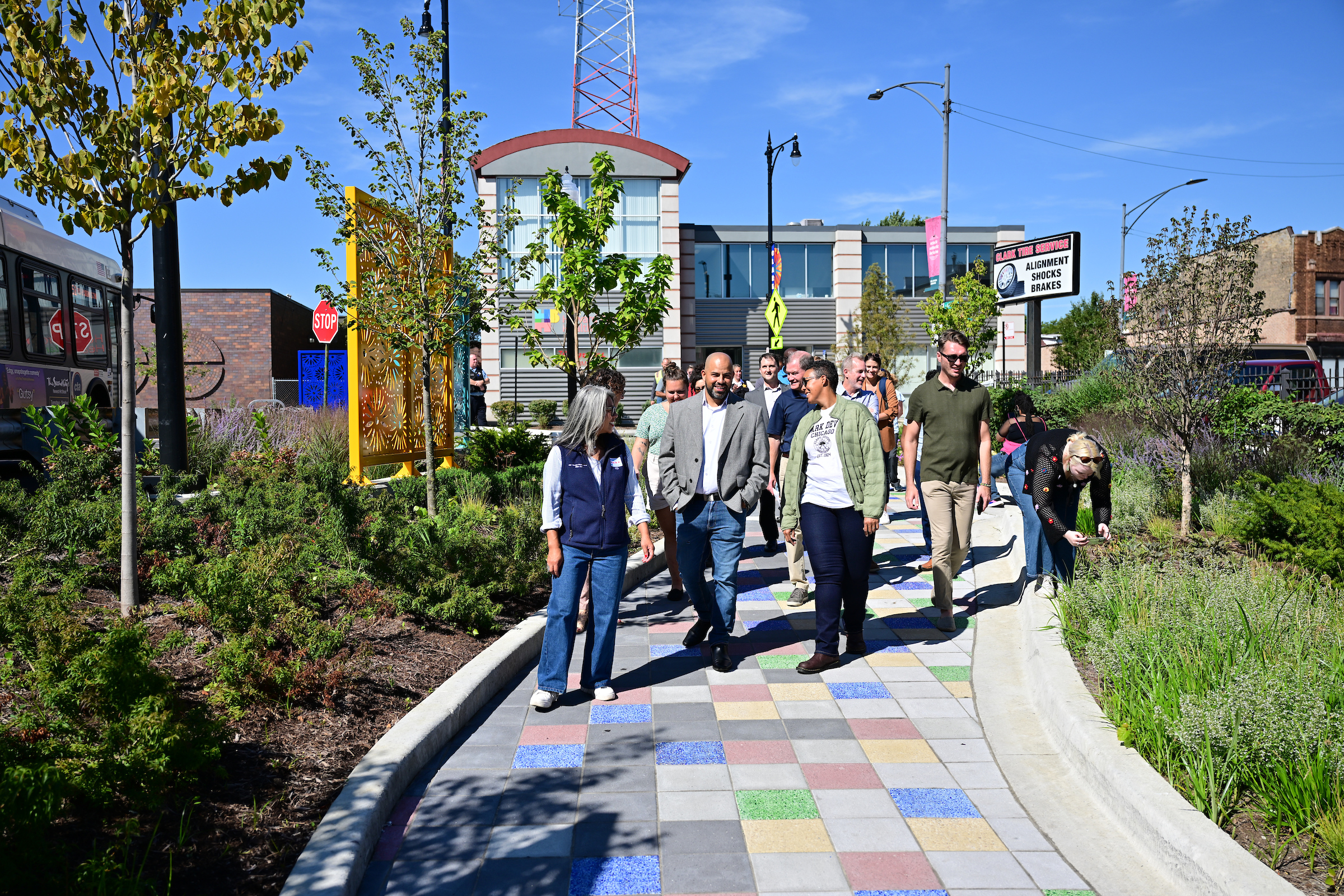 Group of people walking on new pedestrian space 