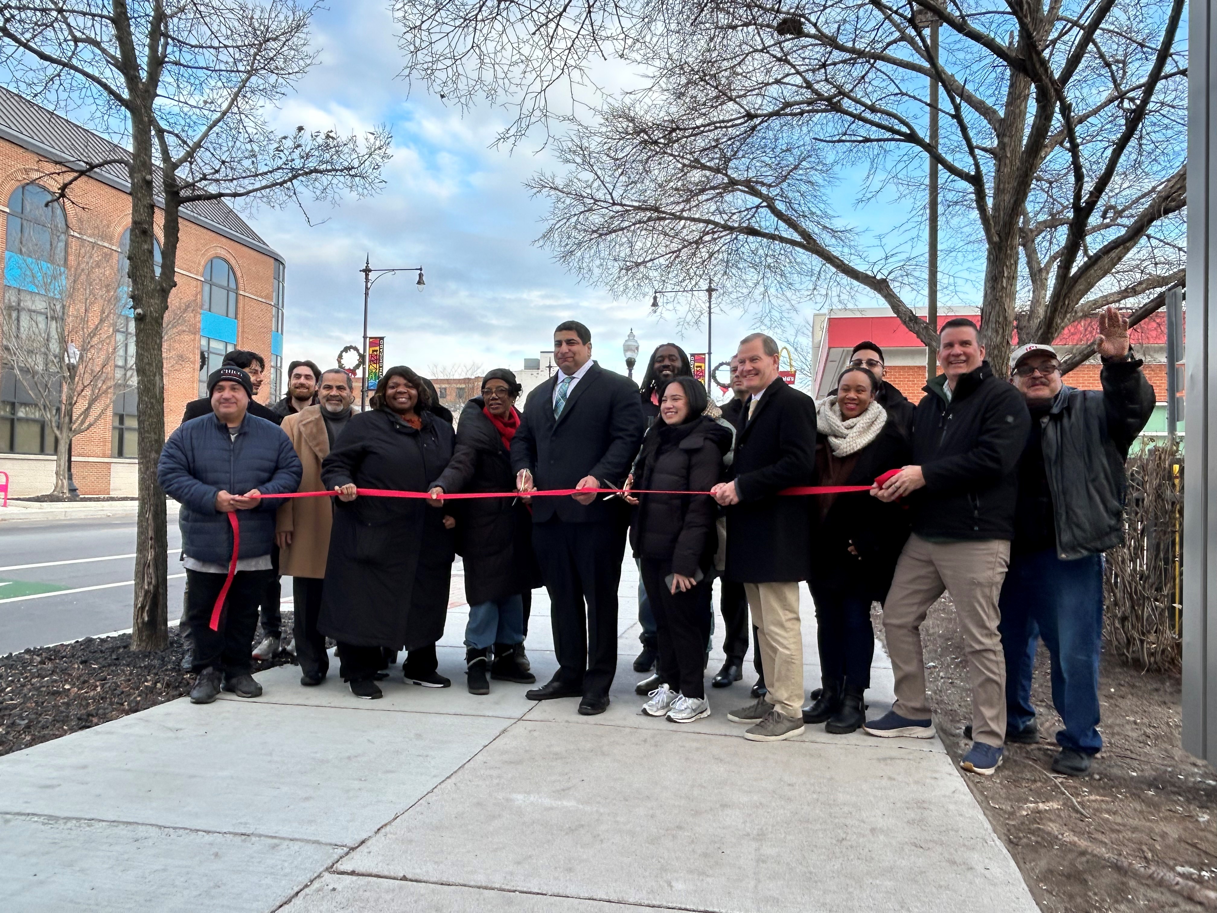 CDOT and 10th Ward leaders cut a ribbon on Commercial Avenue