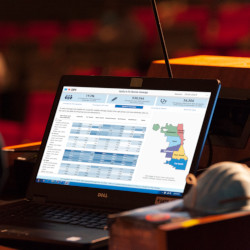 Health Data menu image - laptop with health data dashboard displayed