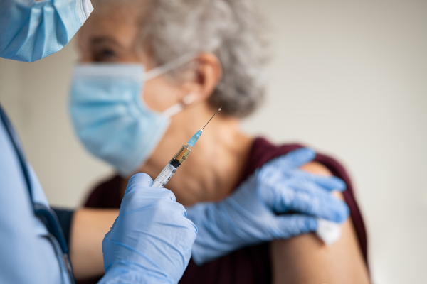 Senior woman getting a vaccination