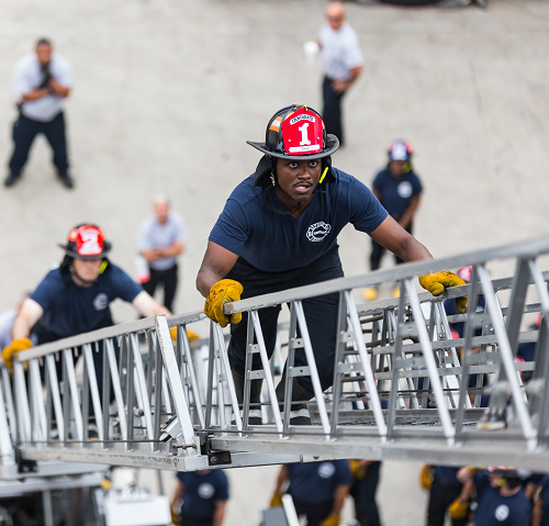 Candidates Climbing an aerial ladder