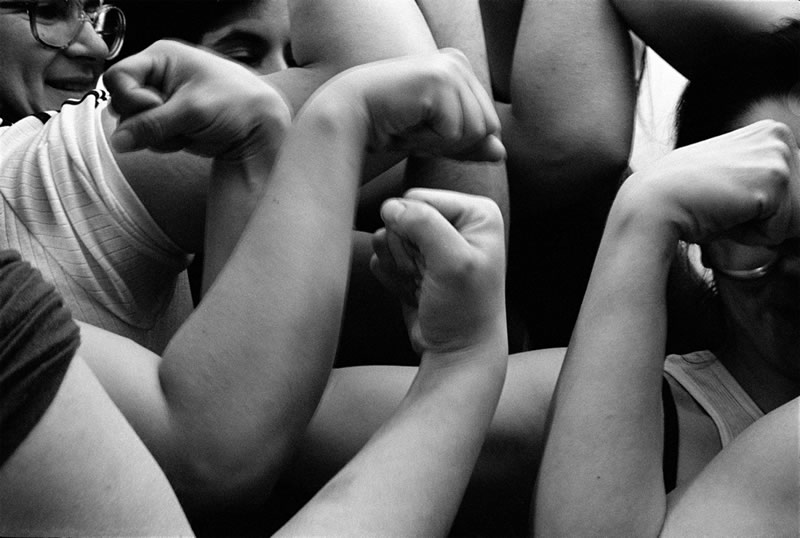 Images on which to build, 1970s-1990s (Diana Solís, Flexing our Muscles: Gathering of Friends, Greenview Street, Lakeview, Chicago, IL, 1981, Archival Piezography Print, 30x40”, Photo Courtesy the Artist)