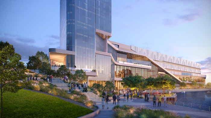 South end of the site image looking down the riverwalk. Shows the base of the hotel tower and casino building