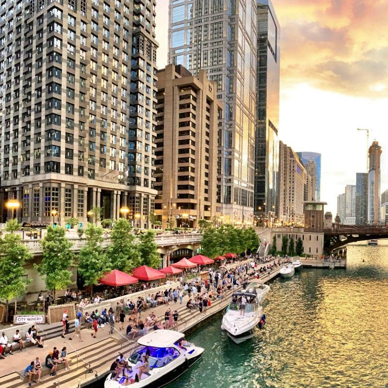 People relaxing on the Chicago riverwalk