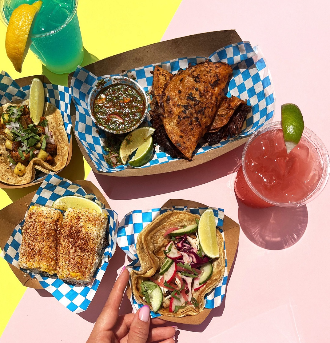 Image of cocktails, tacos, and other food from Taco Rio.