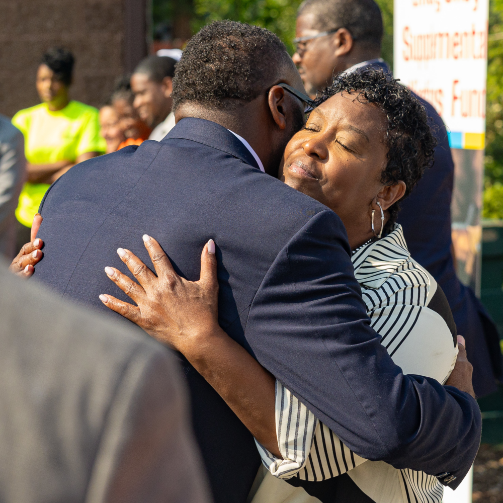 Mayor Johnson embrace